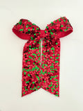 Large red and green sequins bow