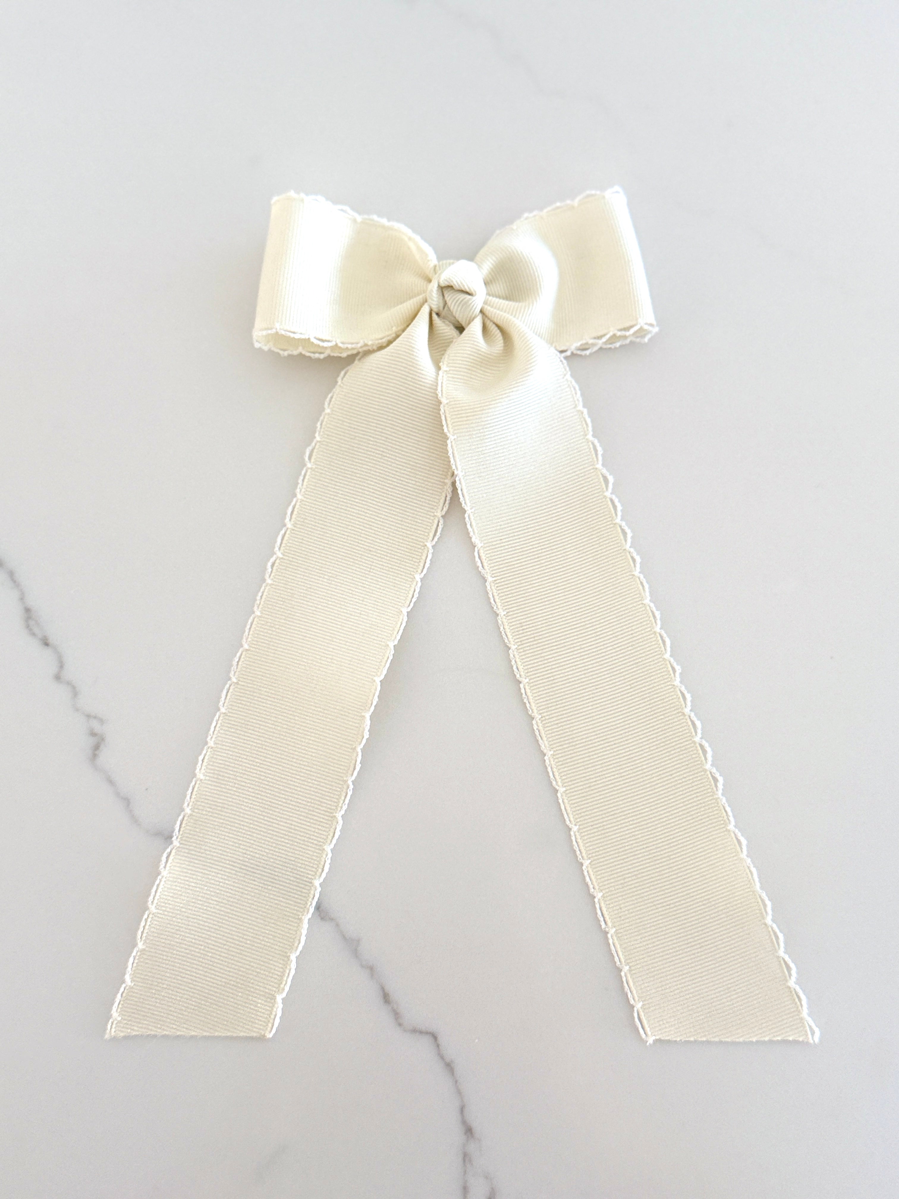 MED cream satin ribbon bow